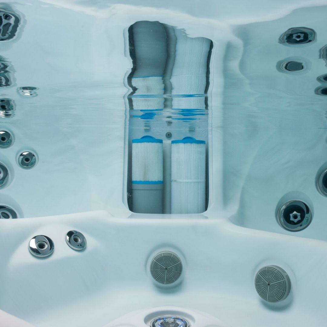 Clean hot tub filters regularly