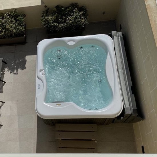 Compact holiday rental hot tub