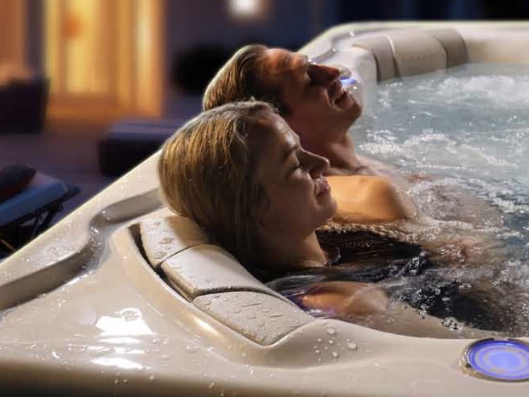 Couple enjoying hot tub