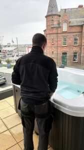 Outback 365 servicing Jacuzzi Lodge hot tubs at Antrim House Portrush one year after installation.