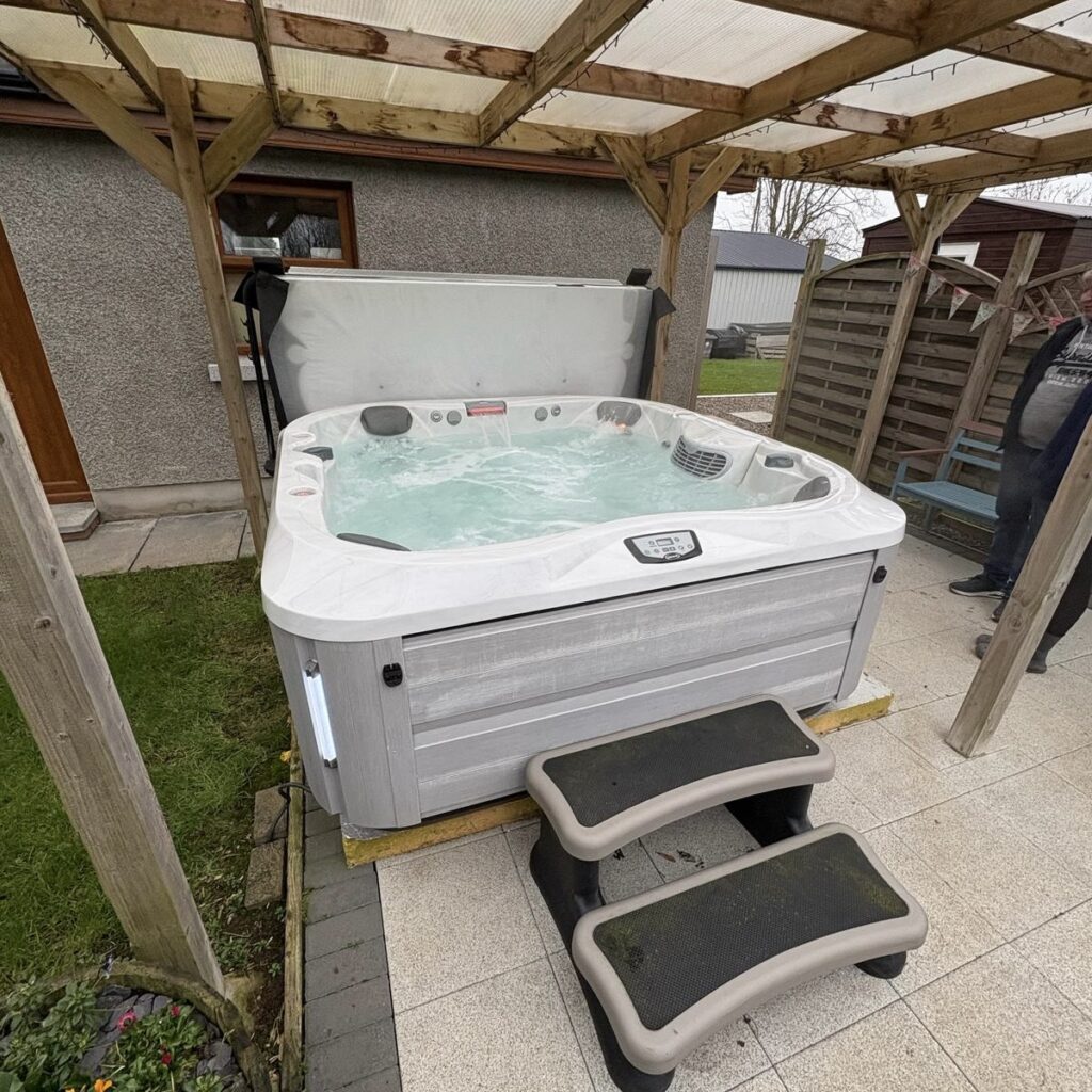 Wooden pergola hot tub install